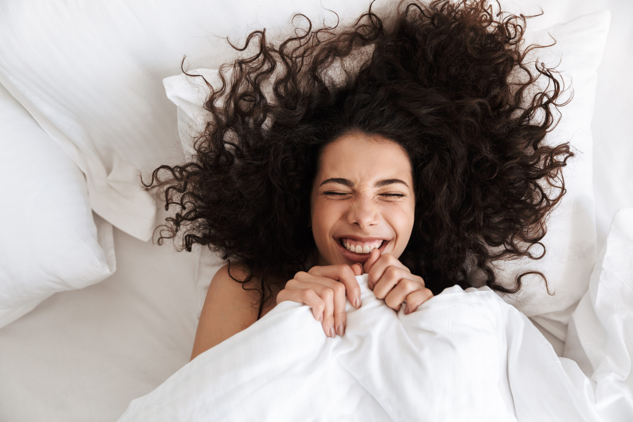 Person sleeping peacefully with a custom occlusal night guard